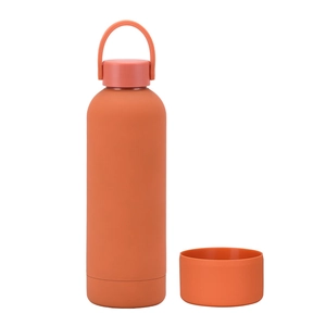 Detail of orange stainless steel water bottle with portable handle and silicone boot