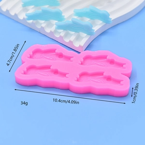 Pink silicone mold with 4 rabbit shapes for fondant chocolate and crafts 10.4x4.7cm
