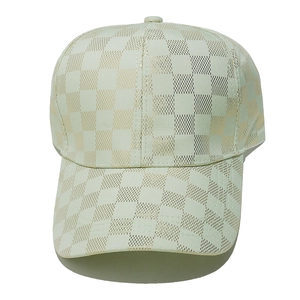 Detail of light green and gold checkered baseball cap with metallic shimmering finish