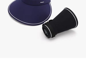 Detail view of foldable sun visor hats showing portable rolled-up design and knit texture