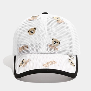 Detail of white mesh baseball cap with brown bear embroidery and Brooklyn lettering