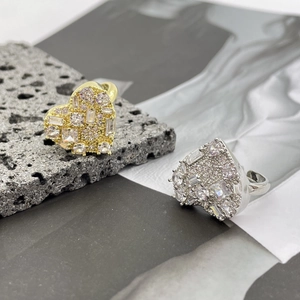 Fashion heart rings with micro-inlaid diamonds in gold and silver plating on volcanic rock
