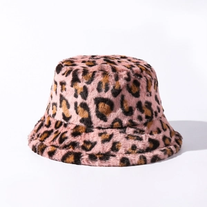 Detailed texture of pink leopard print faux fur on a cozy winter bucket hat for women