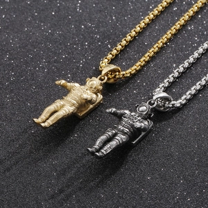 Titanium steel astronaut pendant necklace in gold and silver finish with box chain