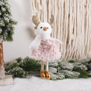 Pink plush Christmas angel ornament with gold glitter antlers and white scarf hanging on tree