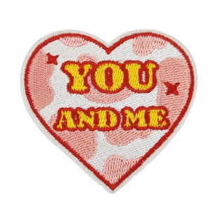 Cow pattern heart embroidery patches with YOU AND ME text in red, yellow and pink