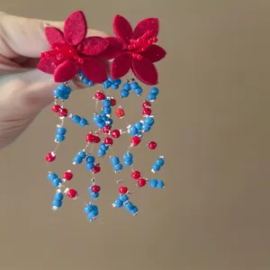 Bohemian floral tassel earrings with red felt flowers and blue red beaded fringe strands
