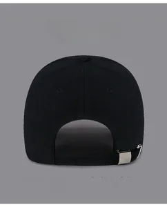 Detail view of the black baseball cap rear showing the adjustable metal buckle closure