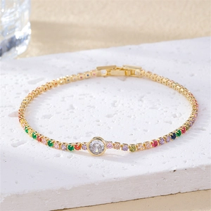 Colorful clover butterfly tennis bracelet in gold with vibrant zircon stones