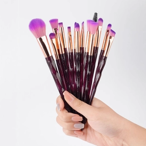 15-piece makeup brush set with purple diamond handles and rose gold ferrules