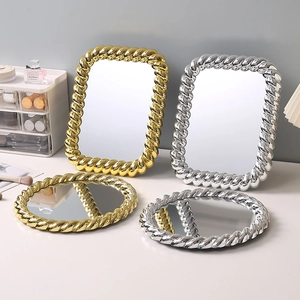 European vintage makeup mirrors in gold and silver finish with elegant twisted frames