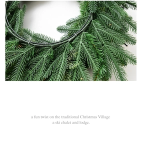 Detailed close-up of realistic PVC pine needles and sturdy metal frame on a green wreath