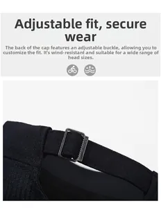 Detail of adjustable metal buckle and textured fabric on the black flat top mesh cap