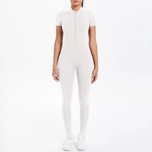 Front view of light grey short sleeve one-piece jumpsuit with half-zip detail