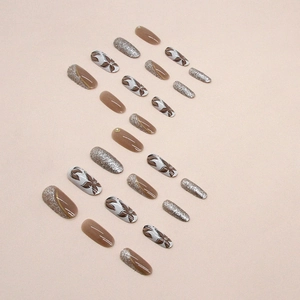 Vintage oval tawny press-on nails with silver glitter and marble floral patterns