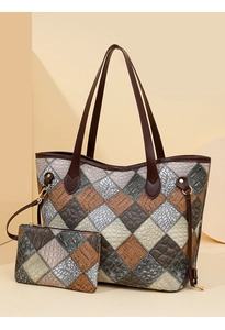 Macro detail of multi-colored patchwork tote bag set with textured faux leather patterns