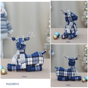 Three-sided view of a blue checkered Christmas reindeer plush with a gray scarf