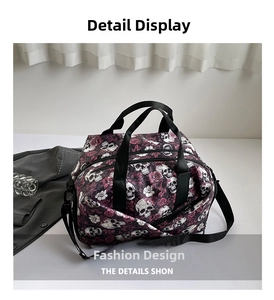 Detail of waterproof travel bag featuring gothic skull and pink rose floral print pattern