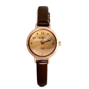 Elegant women's quartz watch with brown leather strap and rose gold round case on white background