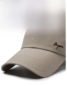 Close-up of durable stitching and curved brim on a quick-dry khaki baseball cap