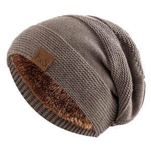 Winter knitted beanie with warm fleece lining and leather F&S label in coffee brown