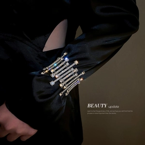 Sparkling multi-layer crystal cuff bracelet with silver metal base on a black background