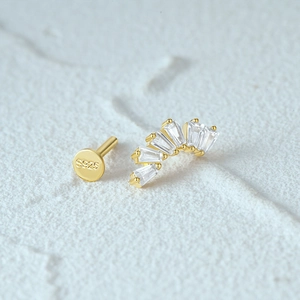 Detail of S925 sterling silver stamp on golden moon curved gemstone earring stud