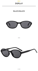 Front and side angles of sleek black oval sunglasses with high-density dark lenses