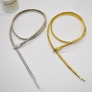 Snake shaped metal link chain belts in gold and silver finishes with realistic snake head