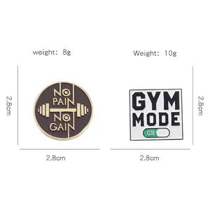 Gym Mode and No Pain No Gain metal enamel pins with barbell motifs and 2.8cm size metrics