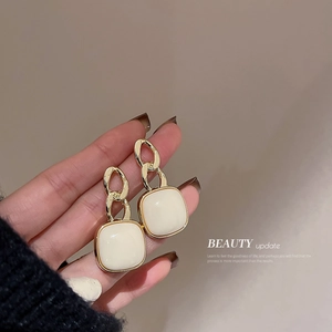 Minimalist cream white pearl drop earrings with gold metal chain and square pendants