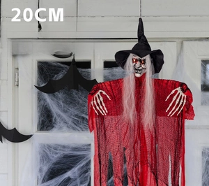 Hanging Halloween witch prop with glowing red eyes, red robes and skeleton hands