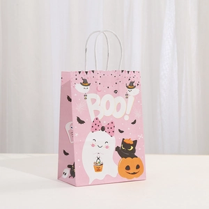 Detail of pink Halloween kraft gift bag with cute ghost, black cat and pumpkin prints