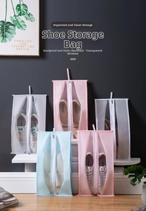 Detail of travel shoe storage bags with clear PVC windows and convenient carrying handles