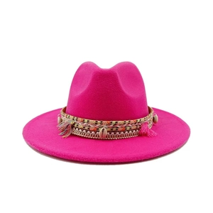 Pink felt wide brim fedora featuring woven band with colorful tassels and seashell charms