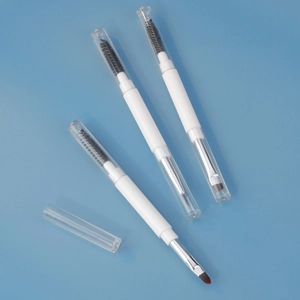 Set of 3 dual-ended makeup brushes with spoolie and concealer brush with clear lids
