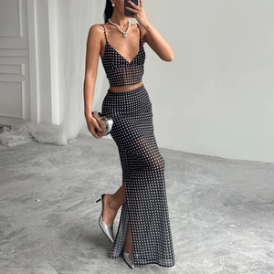 Women's chic black and white polka dot mesh two-piece set with crop top and slit maxi skirt