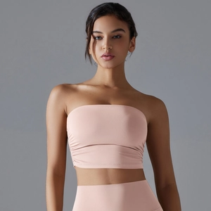 Close-up of pink ruched sports bra set with high elastic breathable fabric for fitness