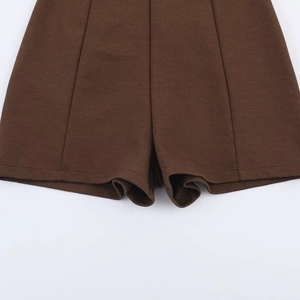 Women's chocolate brown short jumpsuit with bow detail and premium twill fabric texture