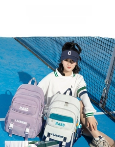 Outdoor shot of large capacity school backpacks with multi-layer pockets and buckle straps