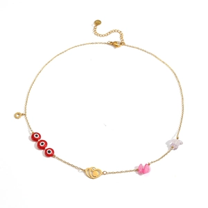 Gold chain necklace with red evil eye, heart charms and colorful natural stones