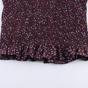 Women's brown polka dot shirt featuring balloon sleeves and ruffled elastic details