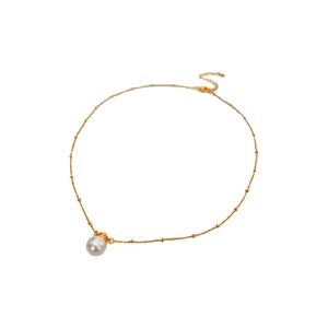 Minimalist gold necklace with a white pearl pendant on a delicate chain in high detail