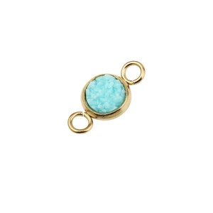 Macro view of 6mm gold plated stainless steel connector with light blue crystal druzy
