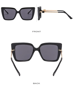 Three-way view of butterfly cat eye oversized sunglasses with black frame and gold metal temples