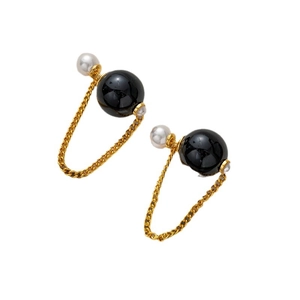 Elegant gold chain tassel earrings featuring a black sphere and white pearl drop design