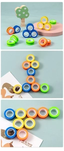 Macro display of colorful magnetic fidget rings in blue, yellow, orange and green colors