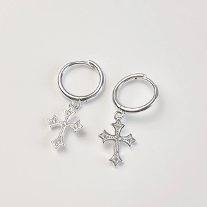 Close-up of S925 sterling silver hoop earrings with zircon-inlaid cross charms