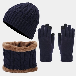 Detail of cable knit winter set featuring fleece lining and touch screen gloves