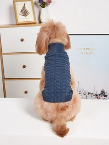 Detail of high-stretch navy blue knitted dog sweater with classic checkered pattern